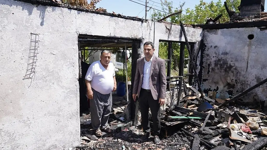 Başkan Tezcan evi yanan vatandaşları yalnız bırakmadı