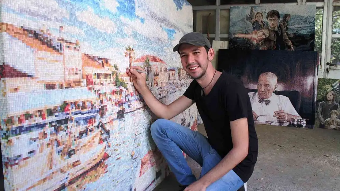 Binlerce parça kumaştan tablo yapıyor
