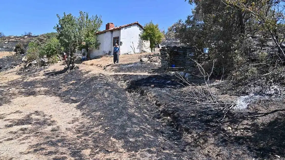 Büyükşehir'in dozerleri mahalleyi yanmaktan kurtardı