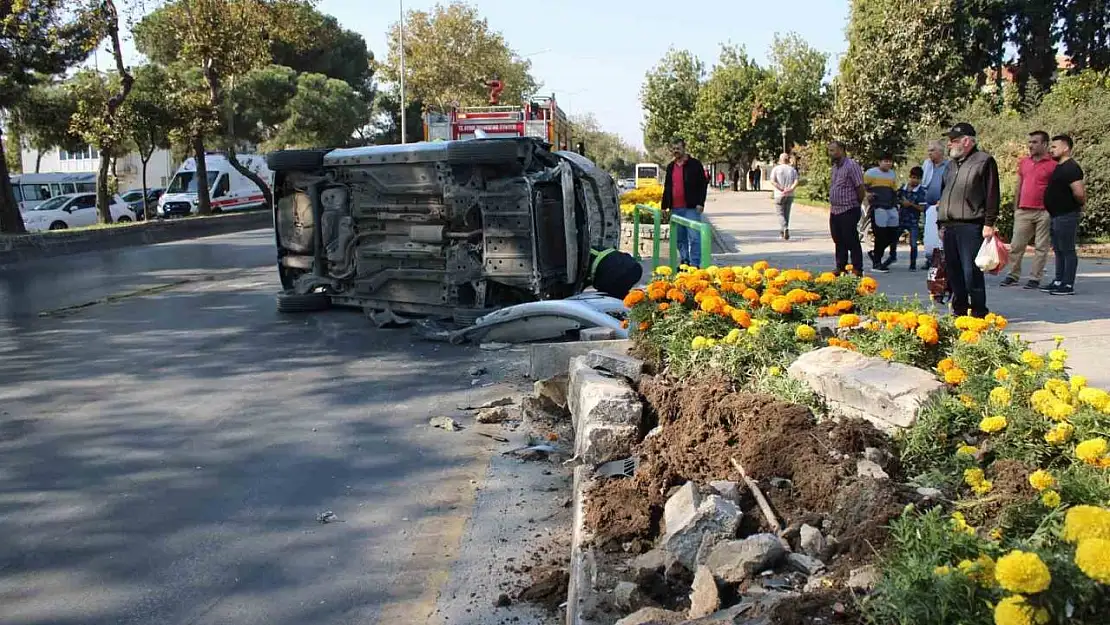 Kontrolden çıkan otomobil yan yatti