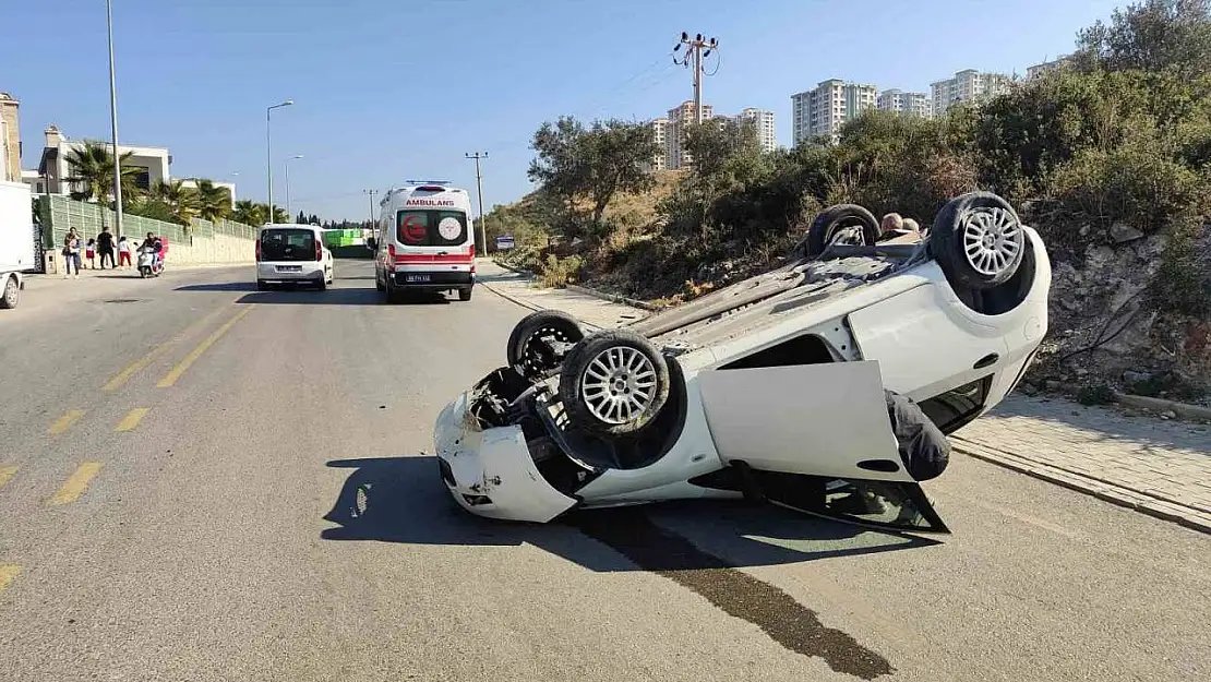 Kuşadası'nda takla atıp, ters dönen otomobildeki sürücü yaralandı