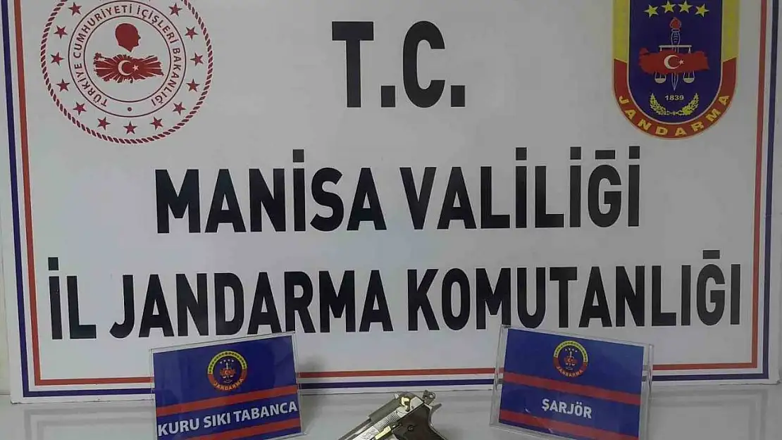 Manisa'da ruhsatsız tabanca ile yakalandı