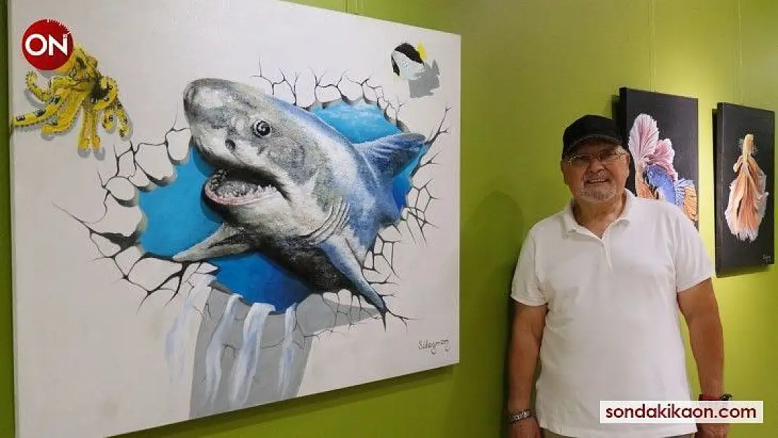 Sualtındaki güzellikleri tuvale yansıtan ressam