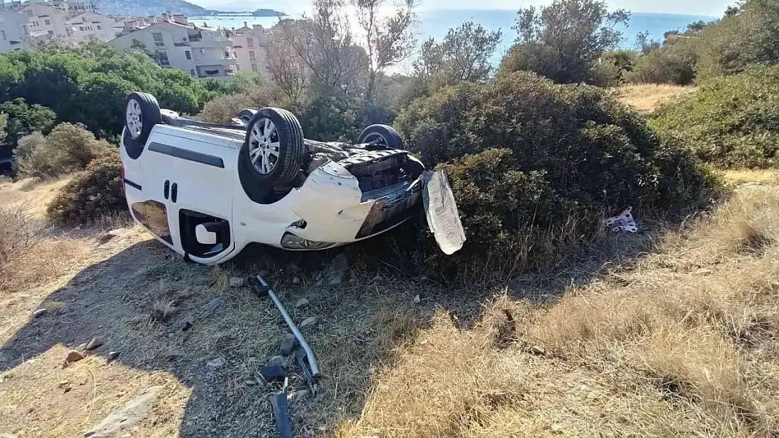Takla atan araçtan yaralı olarak kurtuldu