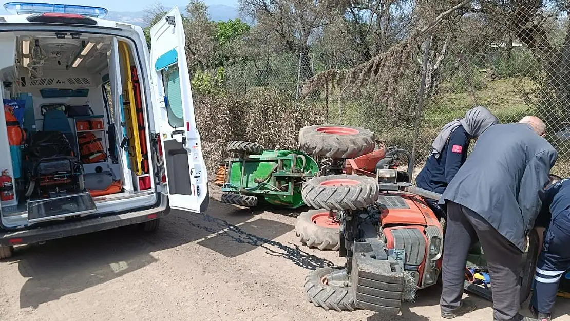 Traktörün altında kalan sürücü ölümden döndü