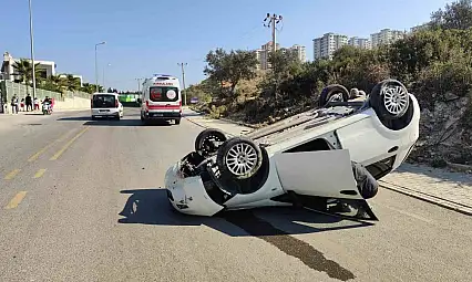 Kuşadası'nda takla atıp, ters dönen otomobildeki sürücü yaralandı