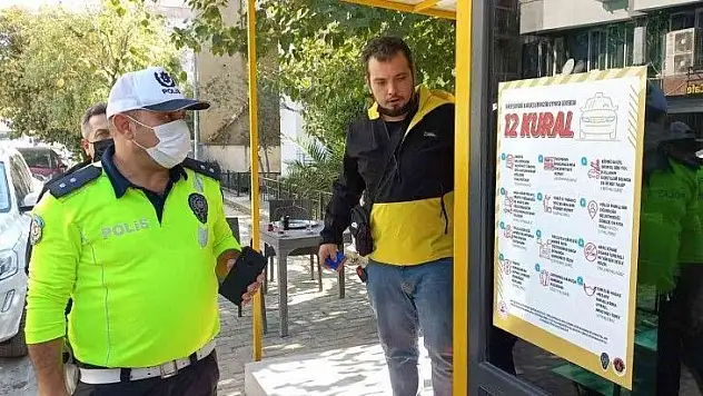 Taksi şoförüne '12 Kural' afişleri asıldı