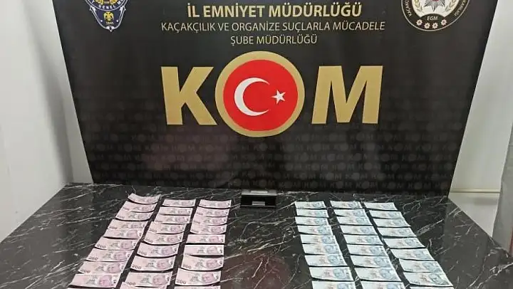 Kütahya'da ormanlık alanda toprağa gömülü 9 bin 500 TL sahte para bulundu