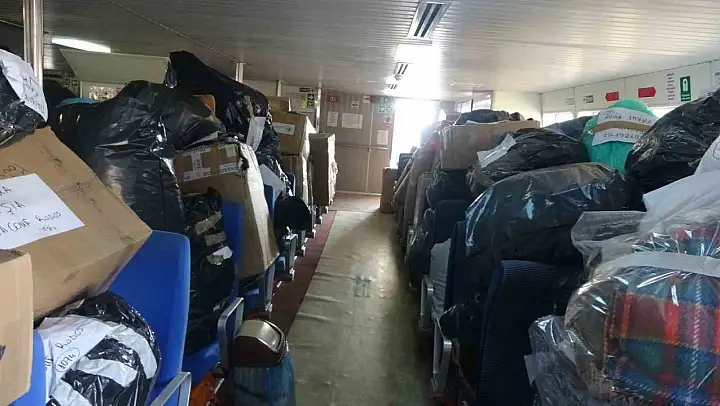 Rodos'tan gelen yardımları orman işçileri karşıladı