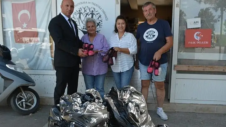 Şefkatli ellerden yoksul öğrencilere 102 çift ayakkabı desteği